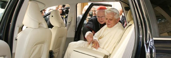 Pope Benedict.  In a car.  A very nice car.  Who says Popes should live piously with few of life’s luxuries?