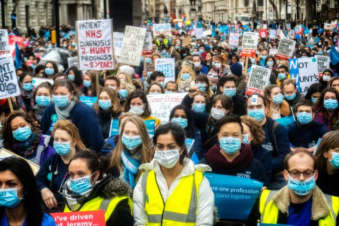 Doctors put on masks and observed three minutes' silence.